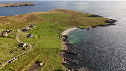 Aerial View of Broonies Taing Beach, Sandwick, Shetland Stock Footage 345473790