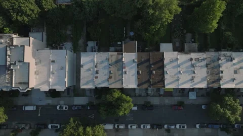 Aerial view of brownstone rooftops in Brooklyn Stock Footage 313898326