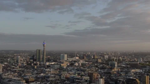Aerial view of BT Tower and buildings rooftops panoramic view at sunrise Stock Footage 125997461
