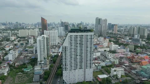 Aerial view of BTS Skytrain and Bangkok city skyline, Thailand. Stock Footage 295883207