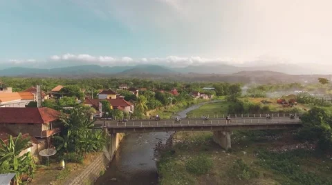 Aerial view of Bubunan town, Seririt, north Bali, mountains in background Stock Footage 68083381