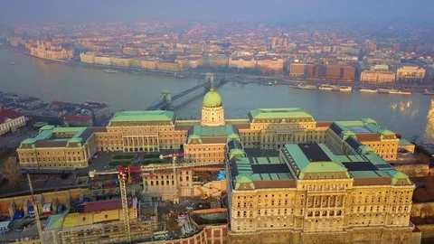 Aerial view of Buda Castle Royal Palace with Chain Bridge and Parliament Stock Footage 84265277