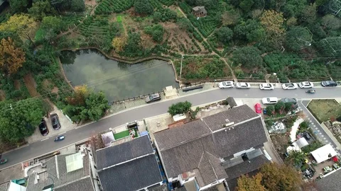 Aerial view of buddhist temple between hills in countryside, China. Video stock 121323988