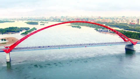 Aerial view of Bugrinsky Bridge traffic crossing Ob River Stock Footage 337027055