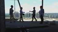 Aerial View Of Builders Team Handshake With Business Man Employer On Stock Footage