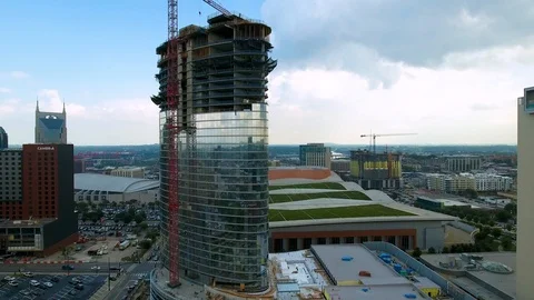 Aerial View of Building Construction Rising to Top in 4k 動画素材 112103549