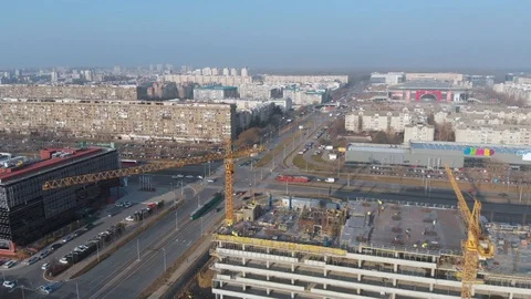 Aerial view of building construction site with crane and workers Stock Footage 126097520