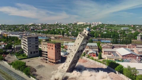 Aerial view of building demolition by explosion. reverse shooting Stock Footage 154237946