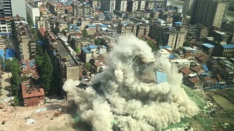 Aerial view of a building explosion in China Stock Footage 79828585