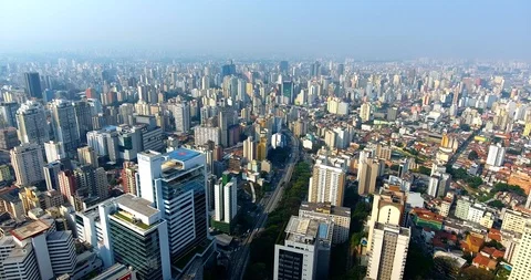 Aerial view of building structures and skyscrapers in the crowded cityscape Stock Footage 114846229