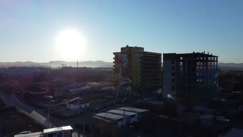 Aerial view of a building under construction in the suburbs Stock Footage 163334665