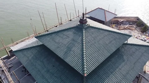 Aerial view of building under construction near water Video stock 279145956