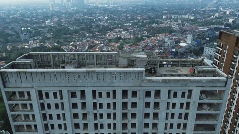 Aerial View: Building Under Construction, Cityscape Stock Footage 297896847