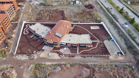 Aerial view of the building under construction at the construction site Stock Photos