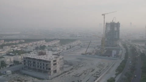 Aerial view on buildings under construction in Dubai Stock Footage 289655908