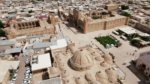 Aerial View of Bukhara Featuring Kalyan Minaret and Islamic Architecture Stock Footage 296525053