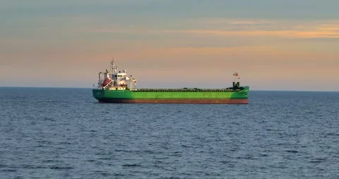Aerial view of bulk cargo carrier sea ship anchored in sea waiting entering port Stock Footage 264166408