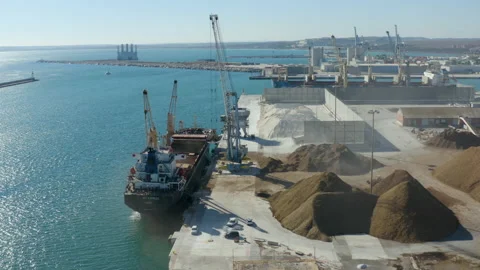 Aerial view of bulk-carrier docked in the port of Alicante Stock Footage 168650490
