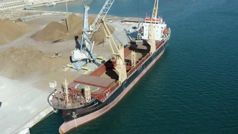 Aerial view of bulk-carrier docked in the port of Alicante Stock Footage 168651194