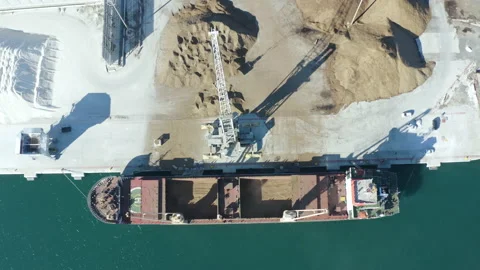 Aerial view of bulk-carrier docked in the port of Alicante Stock Footage 168653381