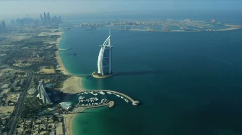 Aerial view Burj Al Arab, Jumeirah Beach Hotel Dubai Stock Footage