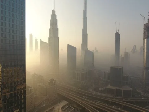 Aerial view of Burj Khalifa downtown Dubai at sunrise. Stock Footage 71425002
