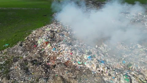 Aerial view of burning garbage dump pollution, landfill - nature destruction Stock Footage 289727831