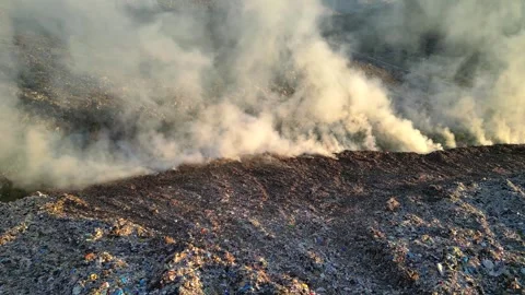Aerial view of burning garbage dump pollution, landfill - nature destruction Vídeo Stock 346243389