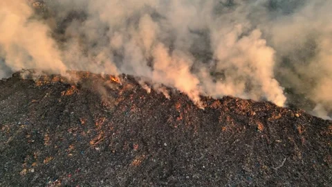 Aerial view of burning garbage dump pollution, landfill - nature destruction Vídeo Stock 346243428