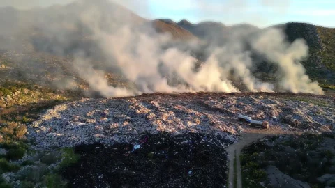 Aerial view of burning garbage dump pollution, landfill - nature destruction Vídeo Stock 346243431