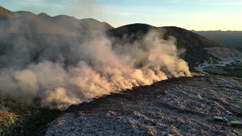 Aerial view of burning garbage dump pollution, landfill - nature destruction Vídeo Stock 346243568