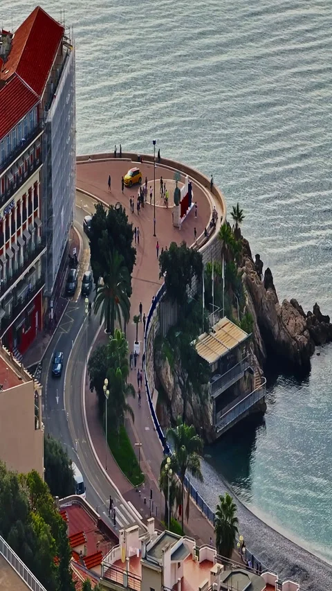 Aerial view of bustling beachfront promenade on sunny day. Beautiful panorama Stock Footage 320420720