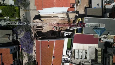 Aerial View of a Bustling Construction Site in an Urban Area During Midday Stock Footage 274718462