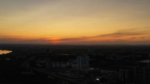 Aerial view of the bustling night view of the city at sunset. Aerial panorami Stock Footage 113006172