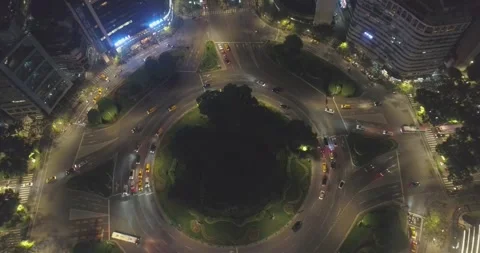 Aerial view of bustling traffic flow at Taipei's Ren'ai Circle during the night Stock Footage 240933356