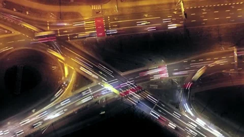Aerial View of Busy City Intersection with Light Trails at Night Video stock 342134259