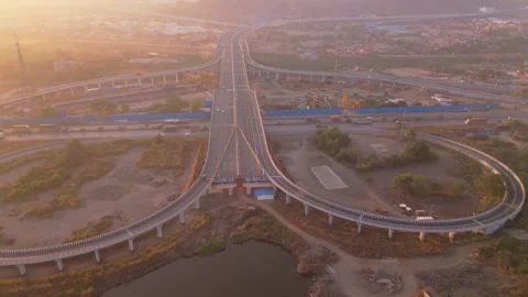 Aerial view busy cloverleaf junction with moving vehicles Stock Footage 300961217