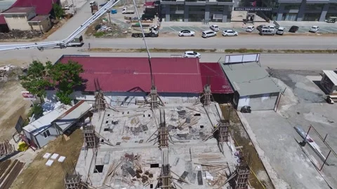 Aerial View: The busy construction zone in Mahmutlar shows Alanya s commitment Stock Footage 296086509