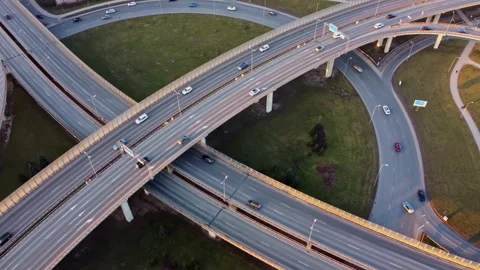 Aerial view of busy highway interchange with traffic in Riga, Latvia during Stock Footage 304484876