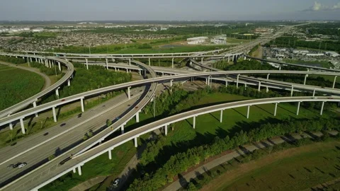 Aerial view of busy highway interchange with multiple elevated roads and sm.. Stock Footage 337682664
