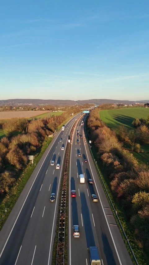 Aerial View of Busy Highway Through Rural Landscape at Sunset Vídeos de archivo 331434062