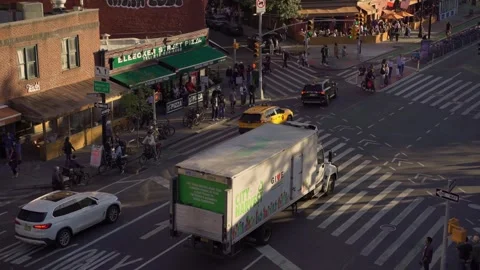 Aerial View of a Busy Intersection in a Lively Urban Community and Environment Stock Footage 291025558