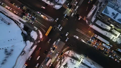 Aerial view of busy intersection at night with car traffic and city lights. Stock Footage 237383825