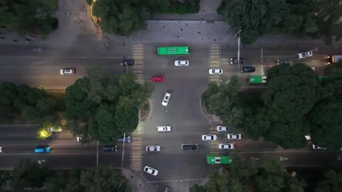 Aerial view of busy intersection with vehicles moving in multiple directions Video stock 339124451
