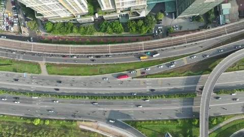 Aerial View of Busy Multi-Level Highway Interchange in Saigon, Vietnam Stock Footage 340970953