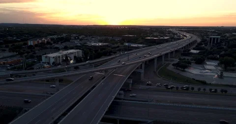 Aerial view of Busy overpass at the Interstate 35 (I-35) &amp; Highway 183 exchange Stock Footage 103464294