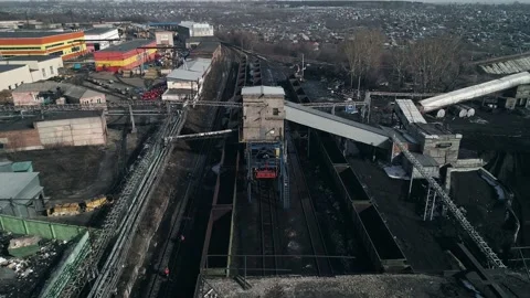 Aerial view to busy railway switchyard hub of freight train car station near Stock Footage 203920980