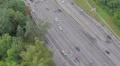 Aerial view of busy road junction, car traffic, rush hour HD Footage