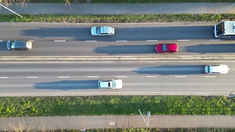 Aerial view of busy traffic on a multi-lane road, showcasing various vehicles Video stock 331813397