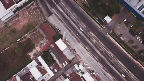 Aerial View of Busy Urban Intersection with Underpass and Traffic Flow Stockbeeldmateriaal 341420881